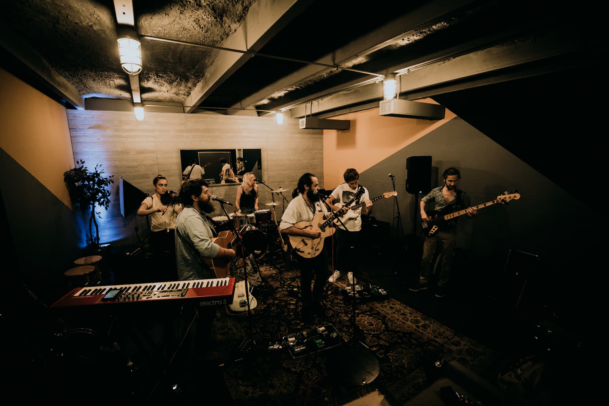 A full band performing live in Studio B